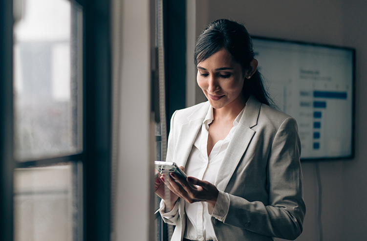 lady on phone for mobile banking