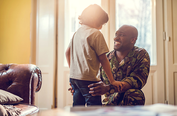 solider greeting child